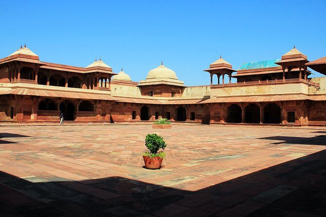 Agra To Jaipur Drop Via Fatehpur Sikri & Chand Baori, Step Well - Your stepwell stop at Chand Baori (Abhaneri) and the shoe test
